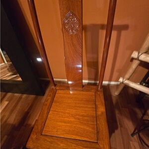 Elegant Wooden Chair with Carved Back